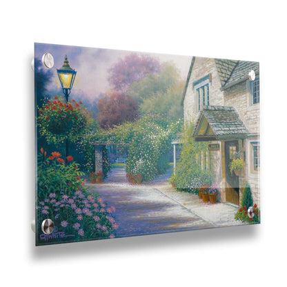 A painting of a bed and breakfast storefront, with a streetlamp-lined path leading to the garden full of blooming flowers. Printed on acrylic.