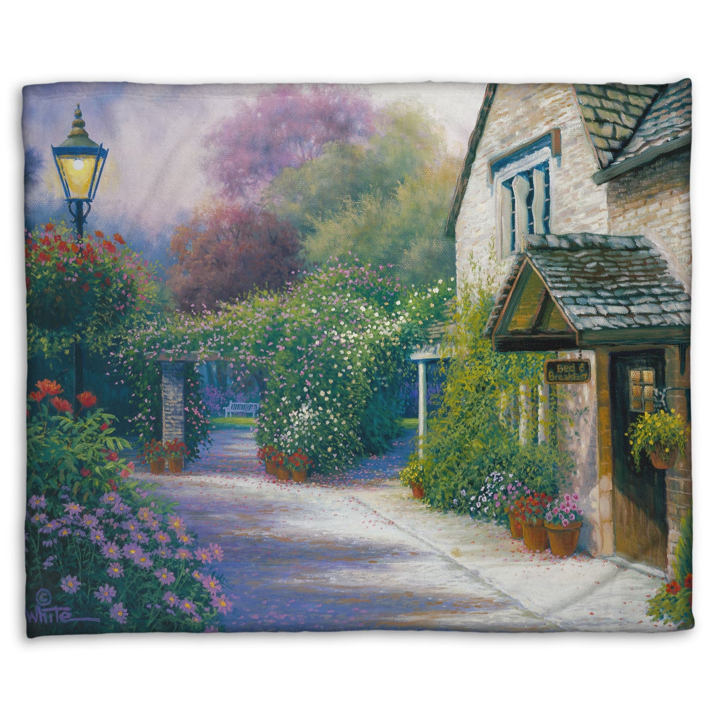A fleece throw blanket designed with a painting of a bed and breakfast storefront, with a streetlamp-lined path leading to the garden full of blooming flowers.