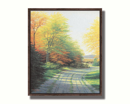 A painting looking down a country road, lined with both deciduous and coniferous trees. Several of the trees' leaves have turned orange and yellow due to the fall season. Printed on canvas in a float frame.