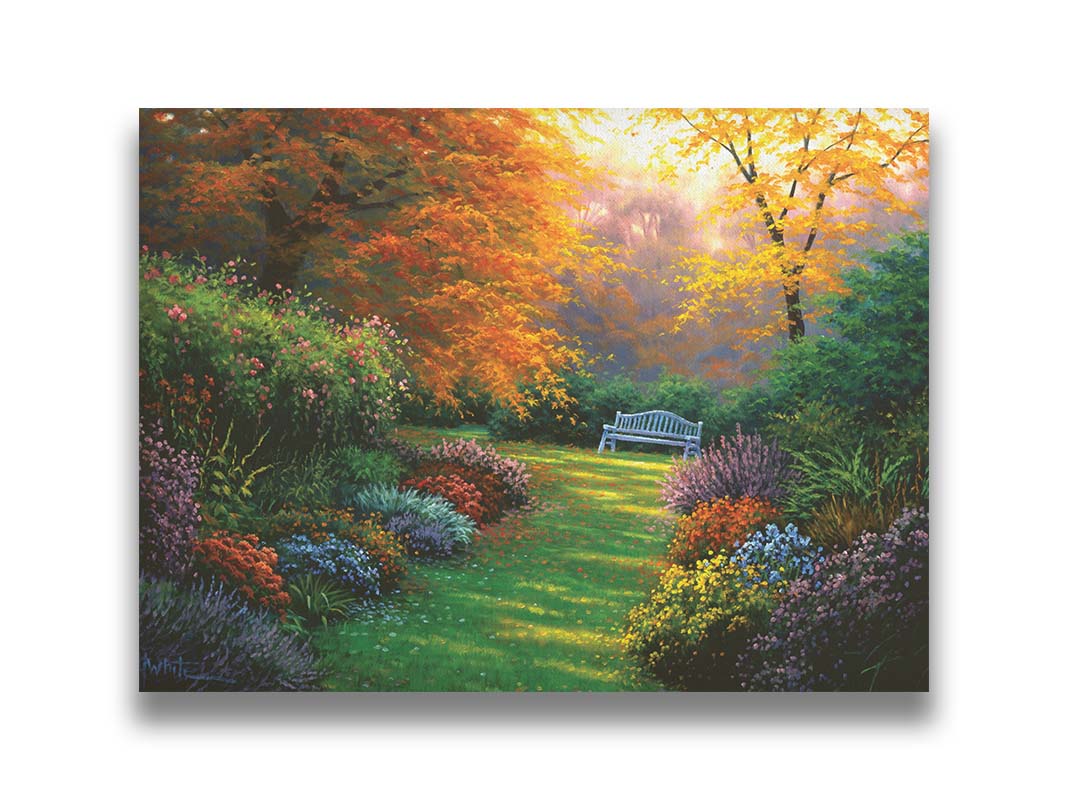 A painting of a garden path during fall. The trees surrounding the garden have turned orange and yellow. A grassy path through the garden is surrounded by bushes of flowers in every color, and a bench can be seen up ahead. Printed on canvas.