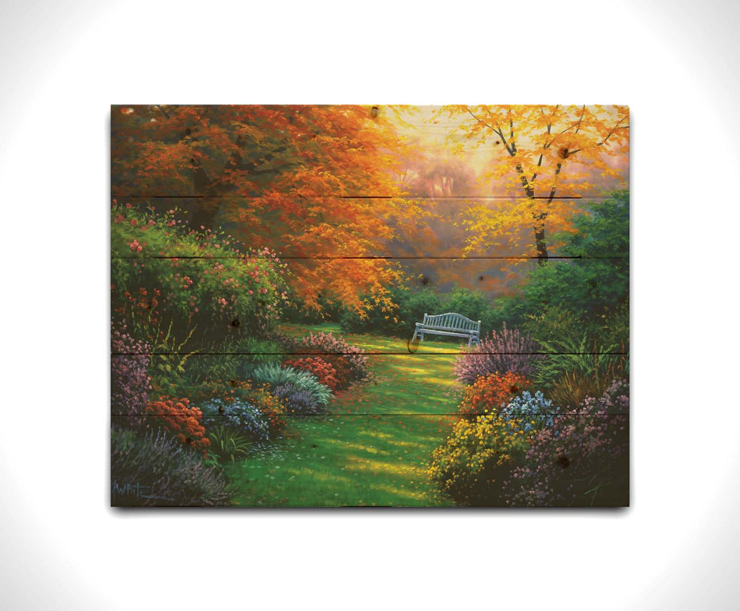 A painting of a garden path during fall. The trees surrounding the garden have turned orange and yellow. A grassy path through the garden is surrounded by bushes of flowers in every color, and a bench can be seen up ahead. Printed on a wood pallet.