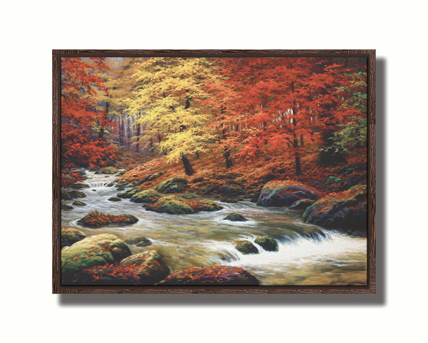 A painting of a river through an autumn forest, with red and yellow trees and an orange, leaf-coated ground. Printed on canvas in a float frame.