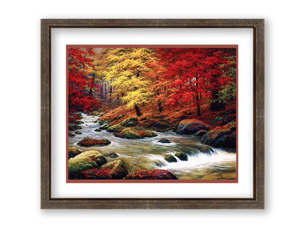 A painting of a river through an autumn forest, with red and yellow trees and an orange, leaf-coated ground. Printed on paper, matted, and framed.