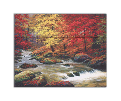 A painting of a river through an autumn forest, with red and yellow trees and an orange, leaf-coated ground. Printed on a box board.