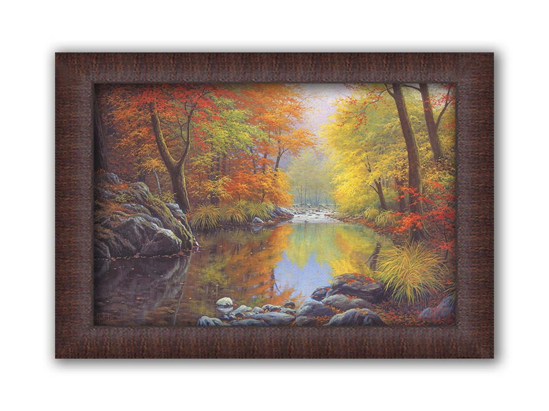 A painting of a river through a forest in autumn, surrounded by red, orange, and yellow trees reflecting on the water. Printed on canvas and framed.