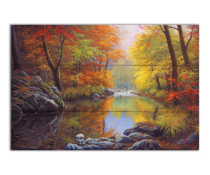 A painting of a river through a forest in autumn, surrounded by red, orange, and yellow trees reflecting on the water. Printed on a box board.