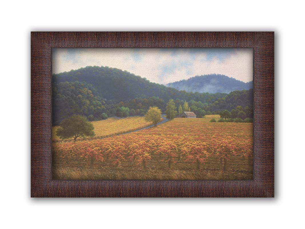 A painting of expansive vineyard fields, turned yellow, red, and orange for the fall. Rolling hills of forests fill the background. Printed on canvas and framed.