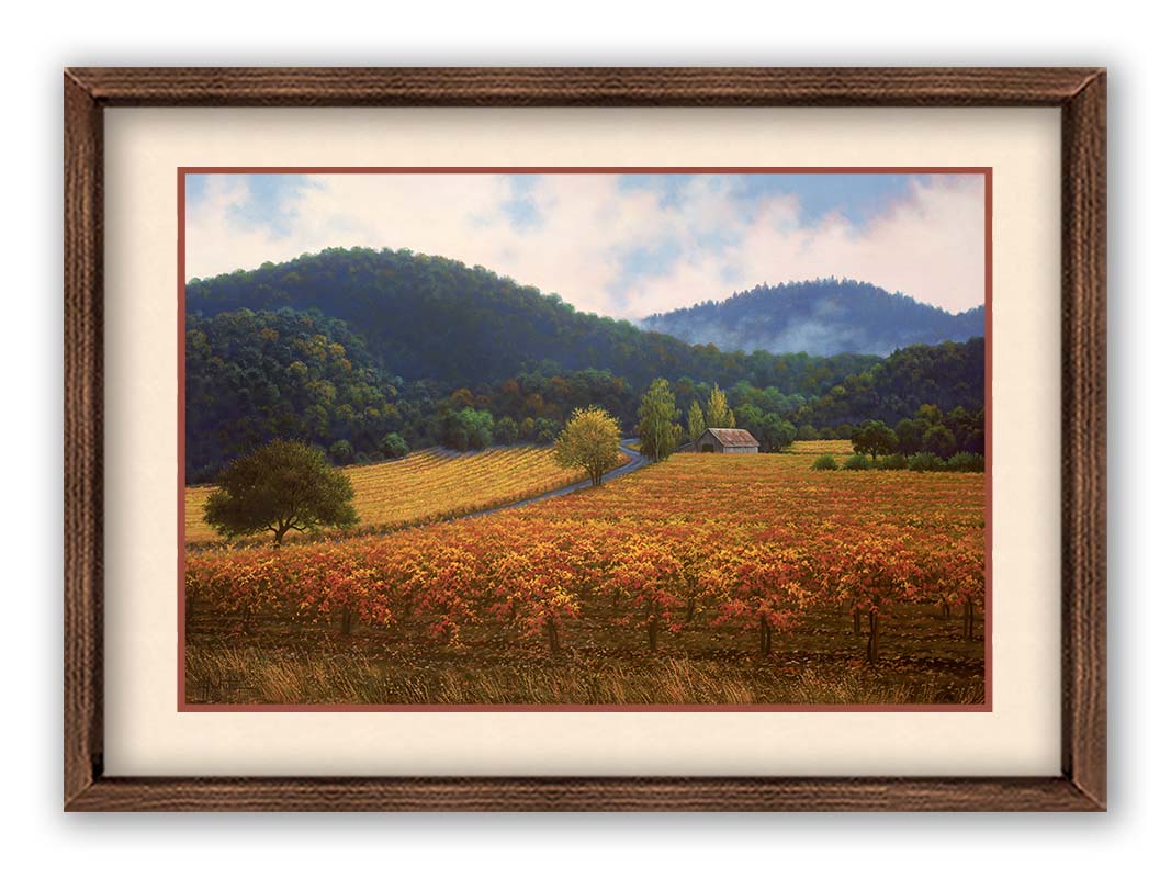 A painting of expansive vineyard fields, turned yellow, red, and orange for the fall. Rolling hills of forests fill the background. Printed on paper, matted, and framed.