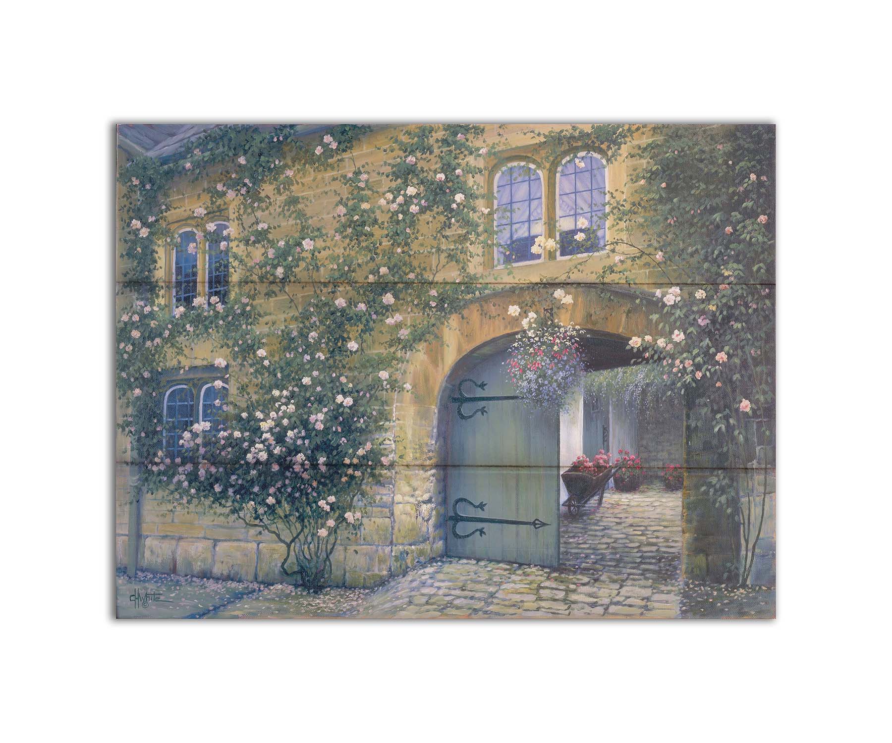 A painting of an arched doorway passing through a building into a courtyard. The building and courtyard are decorated with bushes and vines sprouting an assortment of white and red flowers. Printed on a box board.