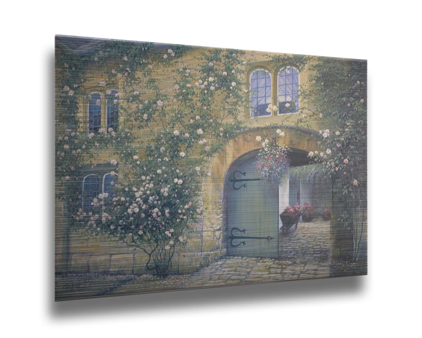 A painting of an arched doorway passing through a building into a courtyard. The building and courtyard are decorated with bushes and vines sprouting an assortment of white and red flowers. Printed on metal.