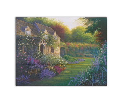 A painting of a blooming garden, with flowers in a variety of pinks, purples, yellows, and whites. A bench site in the grassy clearing beside a cottage, draped in white-flowered vines. Printed on a box board.