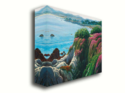 A painting of a clifftop covered in fresh green plants, sprouting pink flowers. Below, the bright blue ocean is calm. Printed on canvas.