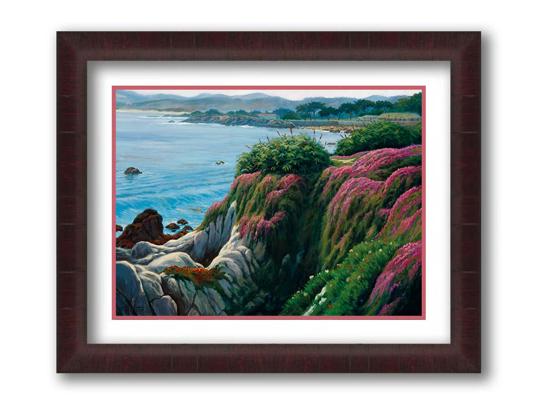 A painting of a clifftop covered in fresh green plants, sprouting pink flowers. Below, the bright blue ocean is calm. Printed on paper, matted, and framed.