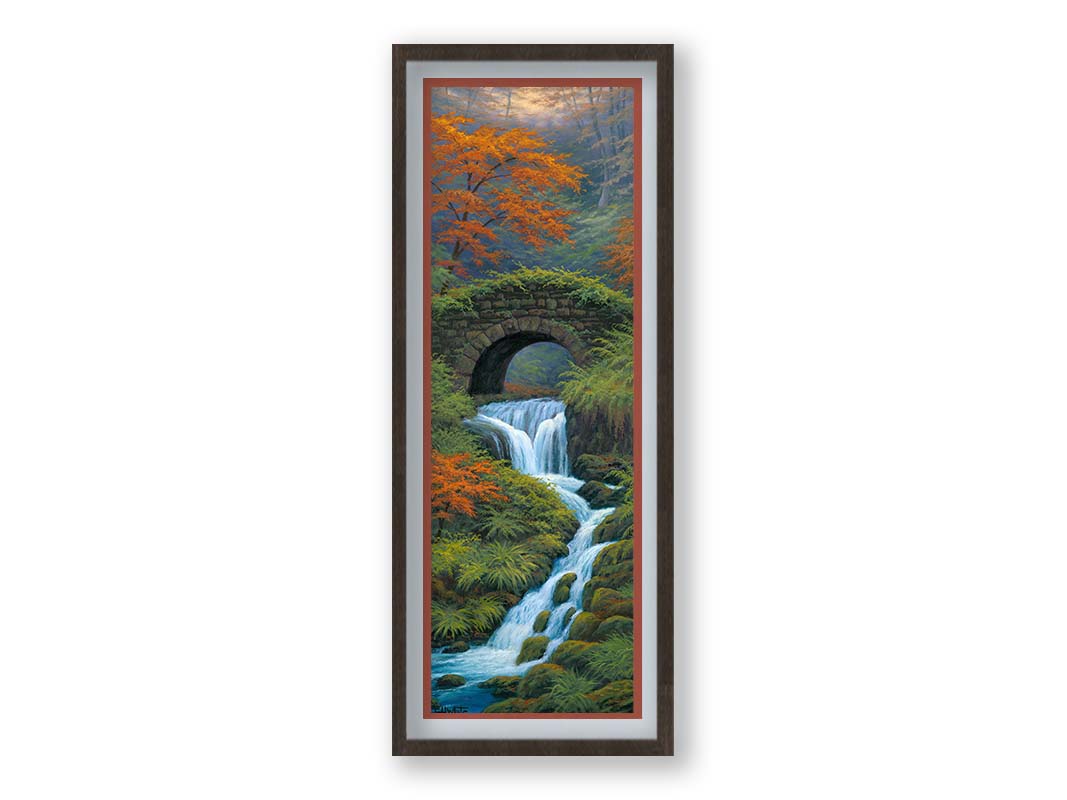 A painting of a creek waterfall, running through a forest. A stone bridge arches over the water. Printed on paper, matted, and framed.