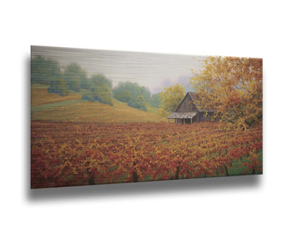 A painting of an old building amidst hills of red, orange, and yellow winery fields Napa Valley is known for. A fog obscures the trees in the distance. Printed on metal.