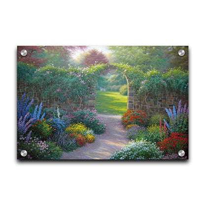 A painting of a stone walled garden with an archway leading to a grassy yard. There are flowers in all colors lining the pathway. Printed on acrylic.