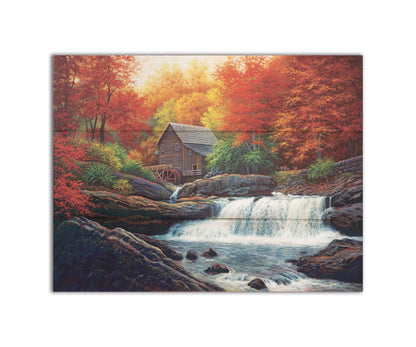 A painting of a stream waterfall in an autumn forest. A watermill can be seen attached to a wood building alone the river. Printed on a box board.