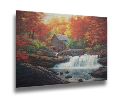 A painting of a stream waterfall in an autumn forest. A watermill can be seen attached to a wood building alone the river. Printed on metal.