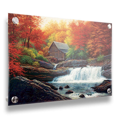 A painting of a stream waterfall in an autumn forest. A watermill can be seen attached to a wood building alone the river. Printed on acrylic.