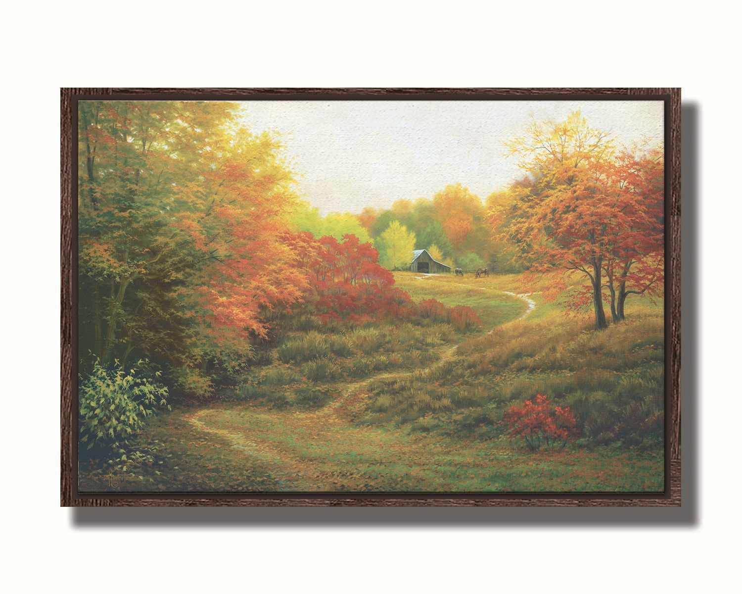 A painting of a worn trail through the grass, bordered by autumn trees. It leads up to an old barn, where a few horses graze outside. Printed on canvas in a float frame.