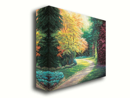 A painting of a landscape with a paved path, lined with lush green, red, and yellow trees and low bushes. Printed on canvas.