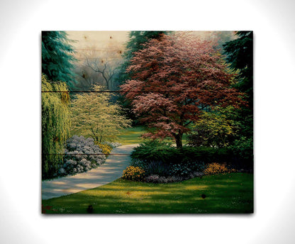 A painting of a carefully tailored yard and garden, with a paved path surrounded by colorful flowers, bushes, and trees. The centerpieces of the garden are japanese maple trees. Printed on a wood pallet.