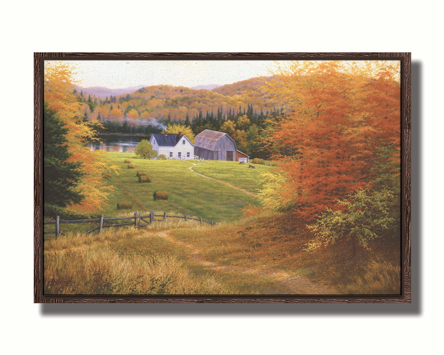 A painting of a view looking down on a lakeside home and barn from a forest, featuring a few farm animals and hay bales. Printed on canvas in a float frame.