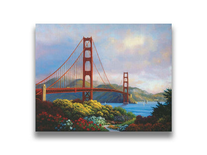 A painting of San Fransisco's Golden Gate Bridge, as viewed from Vista Point. Flowers bloom along the path in the foreground, and Lime Point and the Needles rock formation can be seen in the distance. Sail boats float on the water. Printed on canvas.