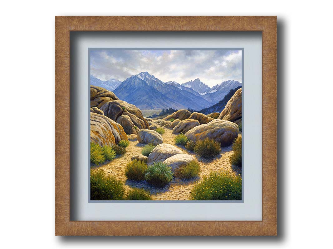 A landscape painting of Mount Whitney as seen from Lone Pine Lake, California. The highly detailed environment of tan stones directs the view to the distant mountains, tinted blue by the atmosphere. Printed on paper, matted, and framed.