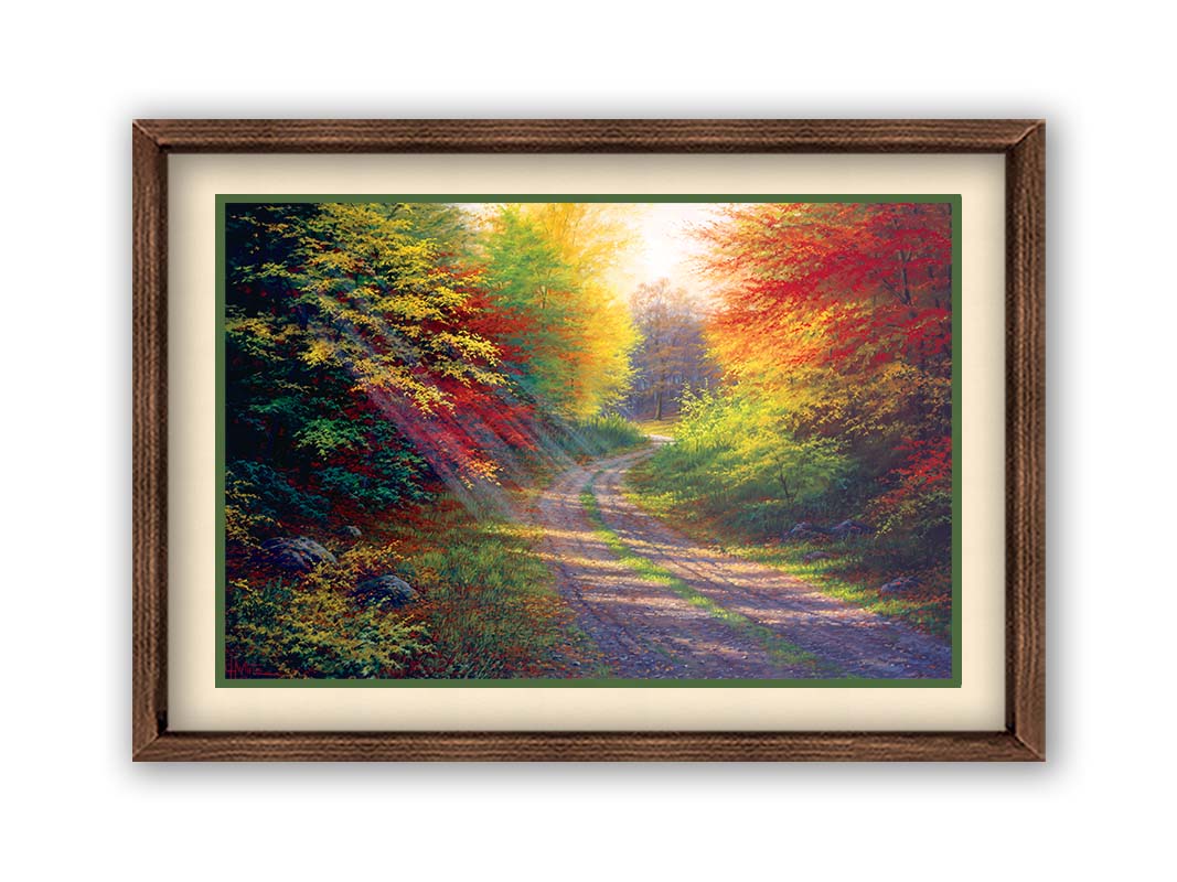 A landscape painting of a gravel road winding thorugh an autumn forest with a mix of vibrant red, yellow, and green leaves. Printed on paper, matted, and framed.