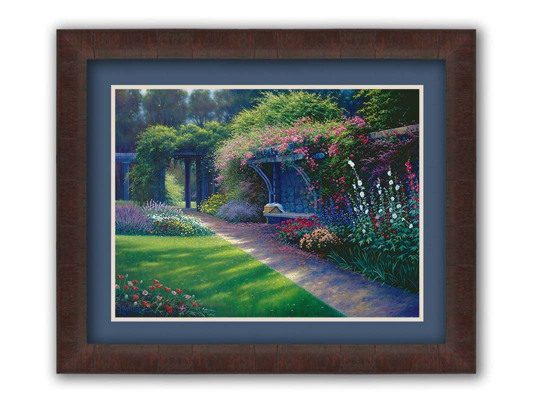 A painting of the Hatley Park Garden at Royal Roads University, overlooking a path surrouded by flowering plants. A bench with a picnic basket sits on the path against a stone wall. Printed on paper, matted, and framed.