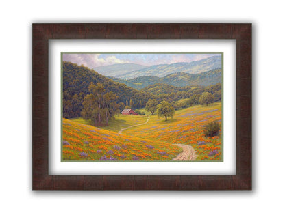 A painting of a grassy field of poppies and lupines on a hilly landscape. A path leads down to a red barn at the edge of a forest. Printed on paper, matted, and framed.