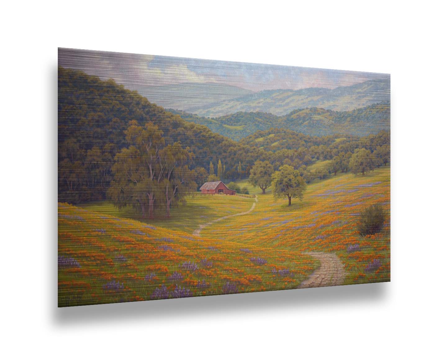 A painting of a grassy field of poppies and lupines on a hilly landscape. A path leads down to a red barn at the edge of a forest. Printed on metal.