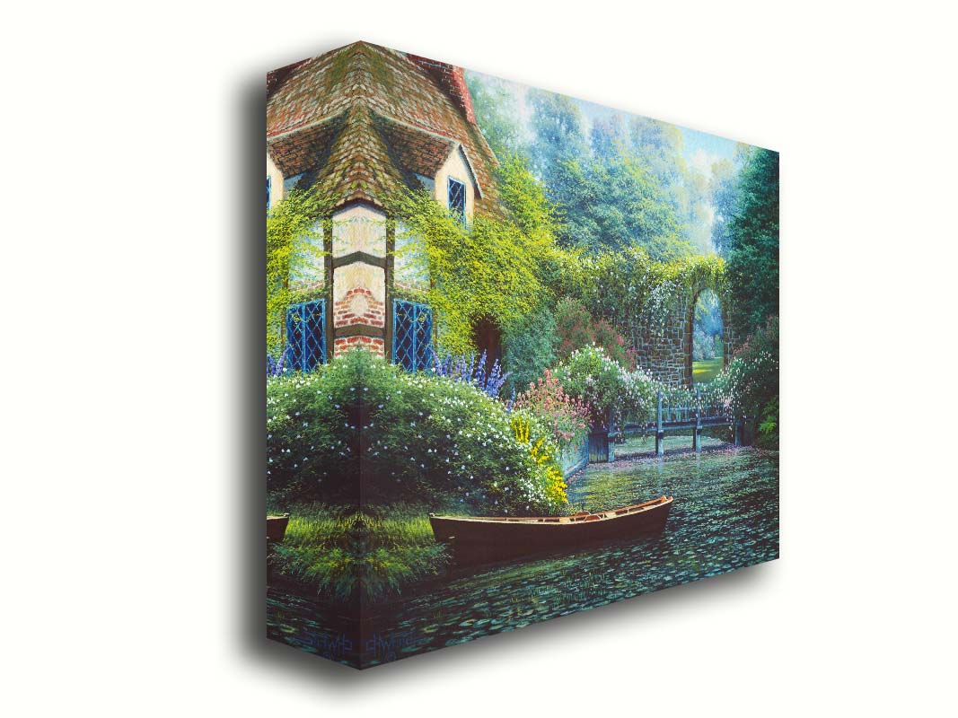 A painting of a canoe docked in a river covered in lily pads. A flower-covered bridge crosses the river, leading to a house coated in vines. A stone arched wall leads to another section of the garden in the background. Printed on canvas.