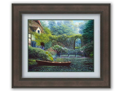 A painting of a canoe docked in a river covered in lily pads. A flower-covered bridge crosses the river, leading to a house coated in vines. A stone arched wall leads to another section of the garden in the background. Printed on paper, matted, and framed.