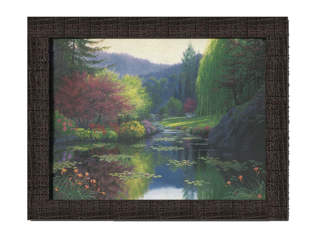 A painting of a large open garden. A pond growing lily pads fills the foreground. Bushes growing flowers in every color line the pond. A white bench sits in a grassy clearing in the background. Printed on canvas and framed.