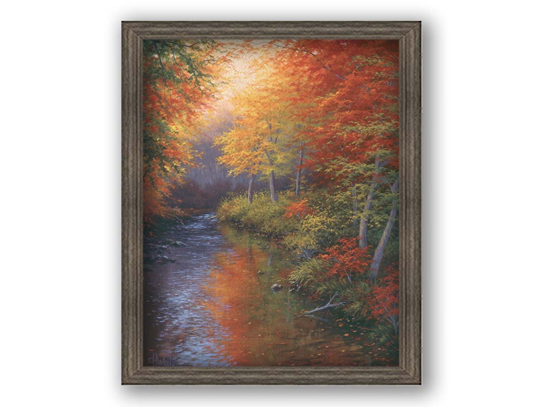 A painting of a forest reflecting off a stream, created using a pallet of warm fall tones. The shedding red and orange leaves land and are carried away by the water below. Printed on canvas and framed.