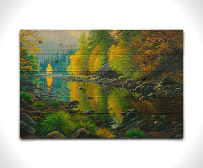 A painting of the Merced River in California. The bright greens and yellows of the forest trees are reflecting beautifully off the water. Printed on a wood pallet.