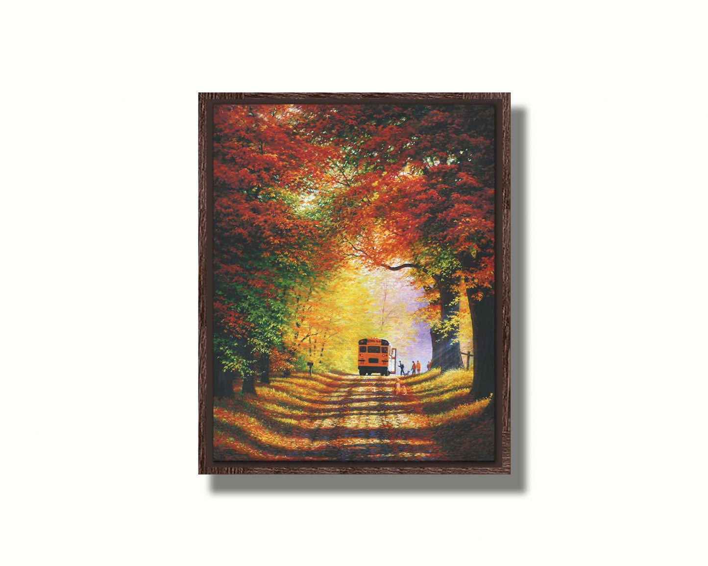 A painting of a narrow road trailing through an autumn forest, where a school bus has stopped to pick up children for school in golden morning light. Printed on canvas in a float frame.