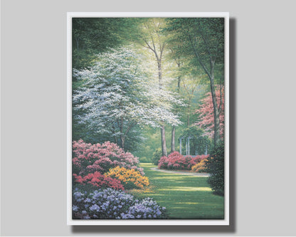 A painting of a vibrant garden, featuring a white gazebo. Flowering shrubs in an array of colors line the grassy path. Printed on canvas in a float frame.