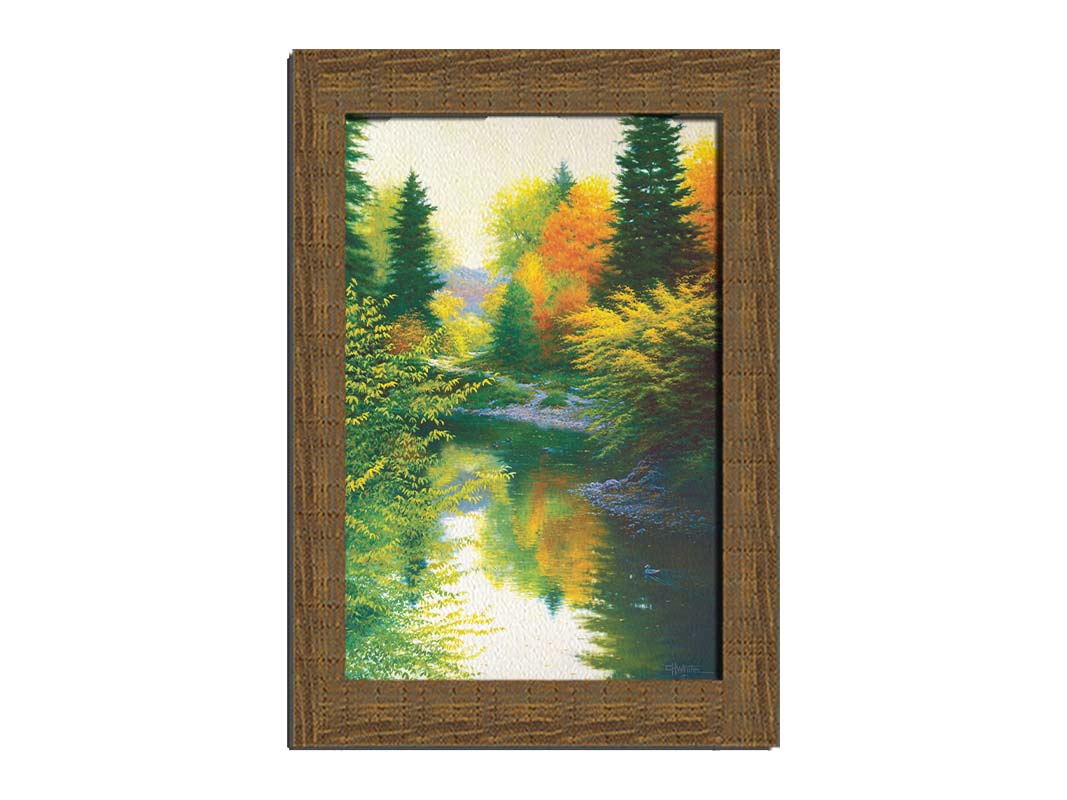 A painting of tranquil water reflecting a forest of orange, yellow, and green trees. A few ducks can be seen swimming on the water. Printed on canvas and framed.