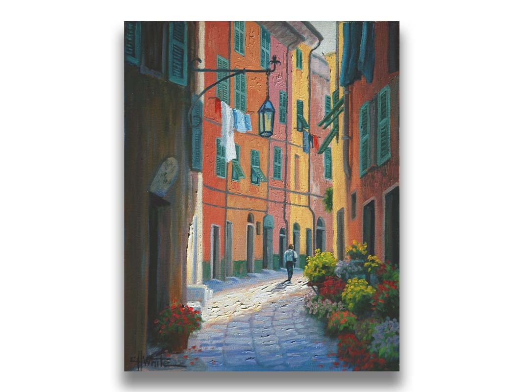 A painting of a stone path through Portofino, Italy. Warm-colored building line the road, clothes hanging from their window lines. Potted flowers grow at the doorsteps. Printed on canvas.