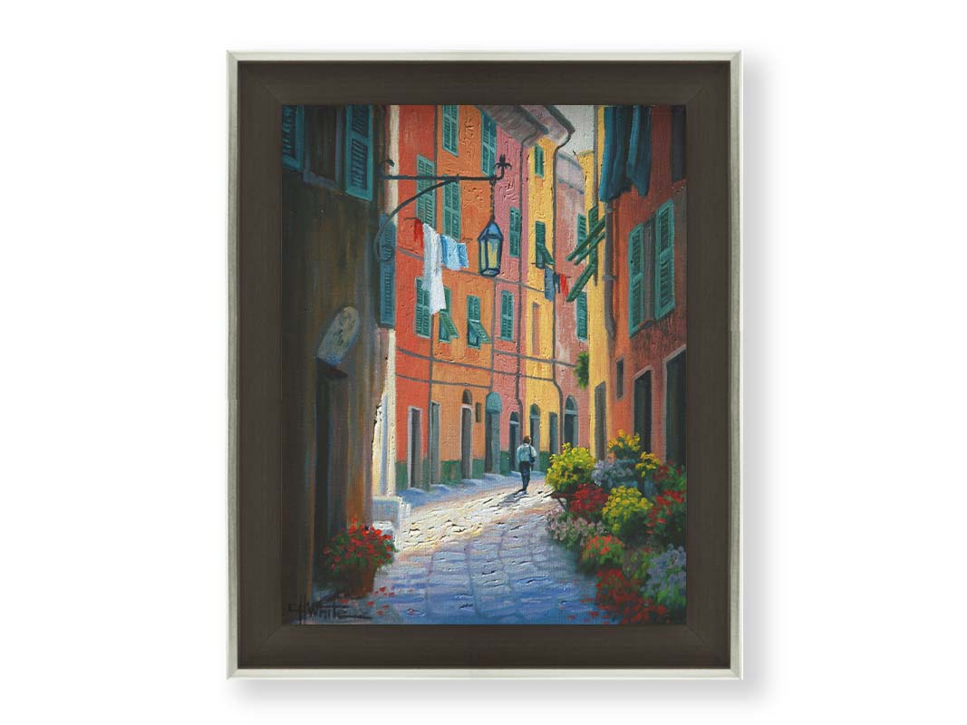 A painting of a stone path through Portofino, Italy. Warm-colored building line the road, clothes hanging from their window lines. Potted flowers grow at the doorsteps. Printed on canvas and framed.