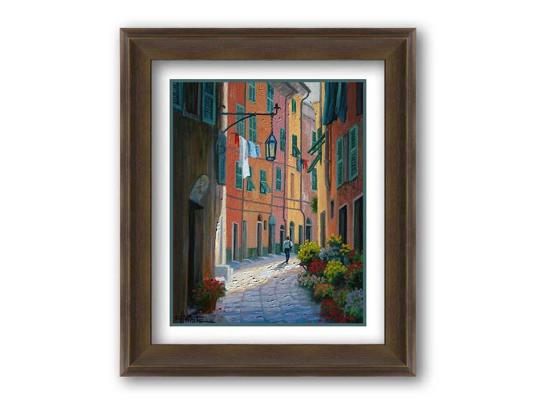 A painting of a stone path through Portofino, Italy. Warm-colored building line the road, clothes hanging from their window lines. Potted flowers grow at the doorsteps. Printed on paper, matted, and framed.