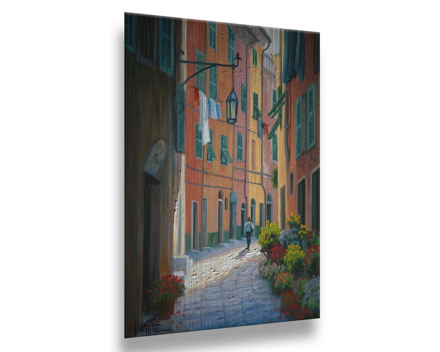 A painting of a stone path through Portofino, Italy. Warm-colored building line the road, clothes hanging from their window lines. Potted flowers grow at the doorsteps. Printed on metal.