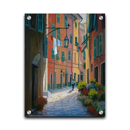 A painting of a stone path through Portofino, Italy. Warm-colored building line the road, clothes hanging from their window lines. Potted flowers grow at the doorsteps. Printed on acrylic.