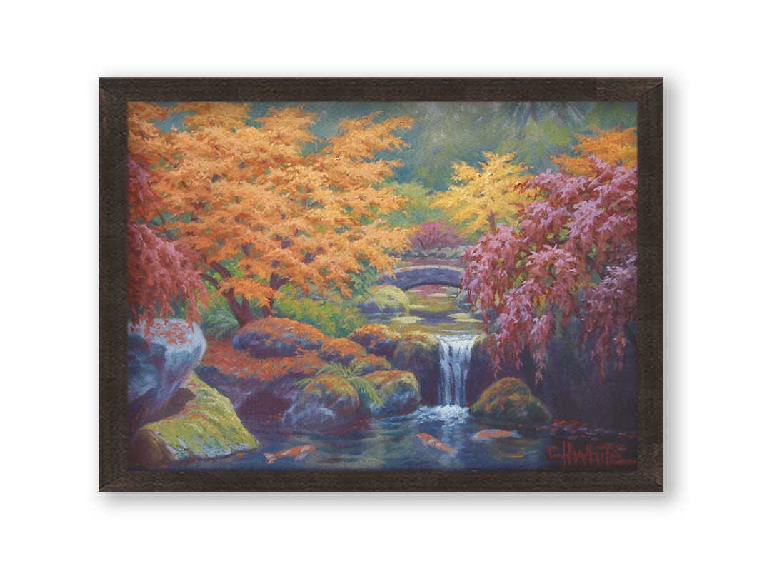 A painting of a garden with red, orange, and green trees. A stone bridge crosses a stream, which runs as a waterfalli into a pond of koi carp. Printed on canvas and framed.