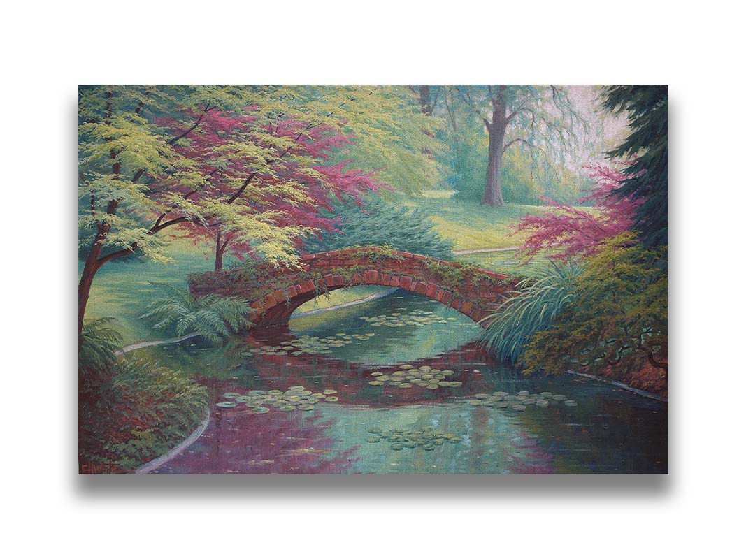 A painting of a red stone bridge crossing a river of lily pads. Red and green trees, grasses, and ferns surround it. Printed on canvas.