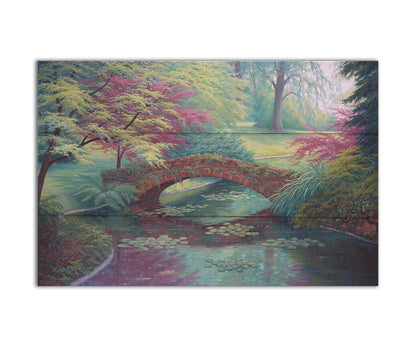 A painting of a red stone bridge crossing a river of lily pads. Red and green trees, grasses, and ferns surround it. Printed on a box board.