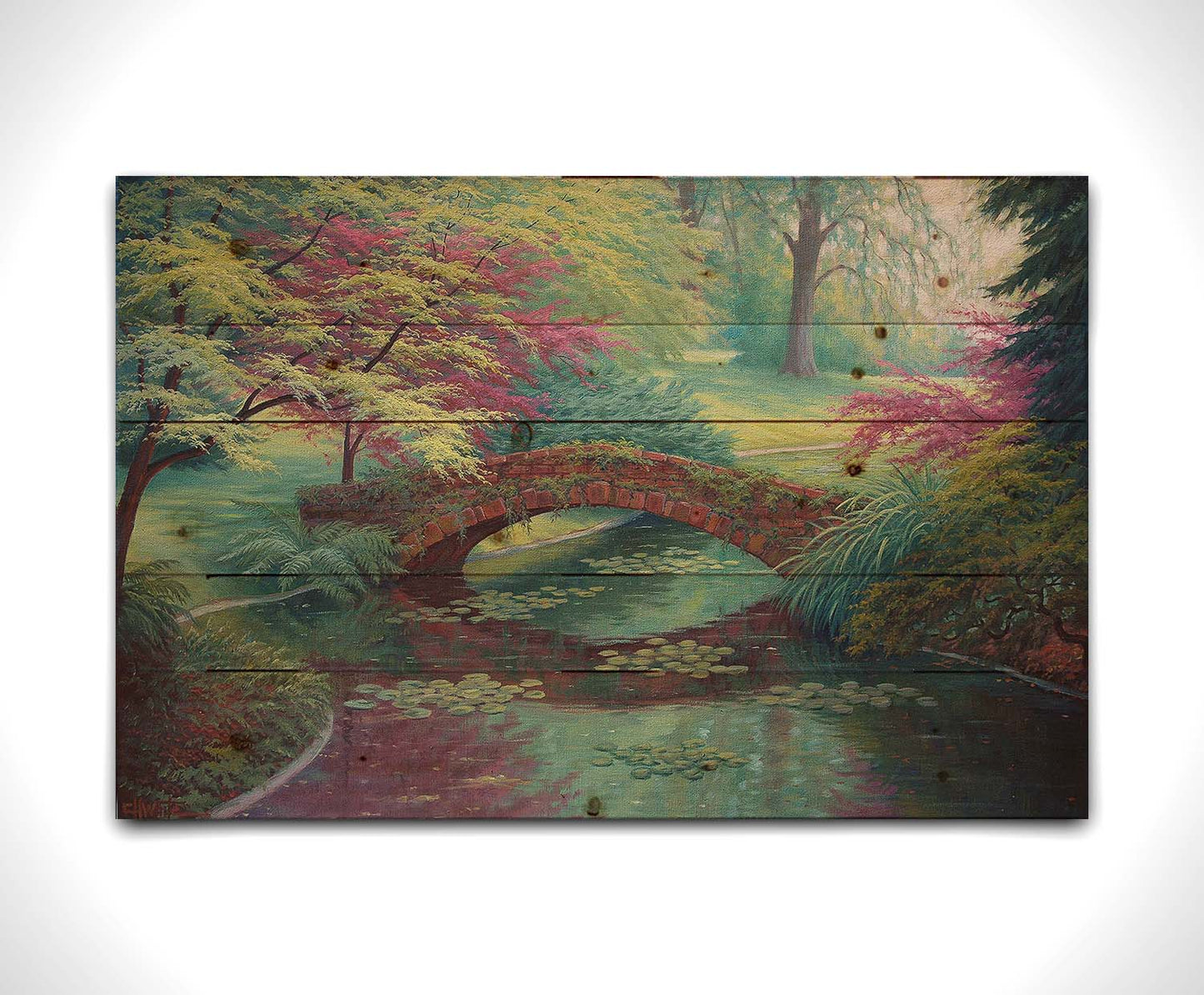 A painting of a red stone bridge crossing a river of lily pads. Red and green trees, grasses, and ferns surround it. Printed on a wood pallet.